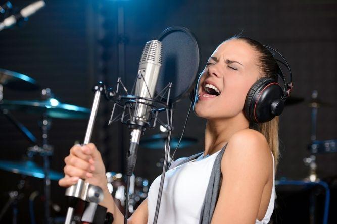 this person is taking singing lessons