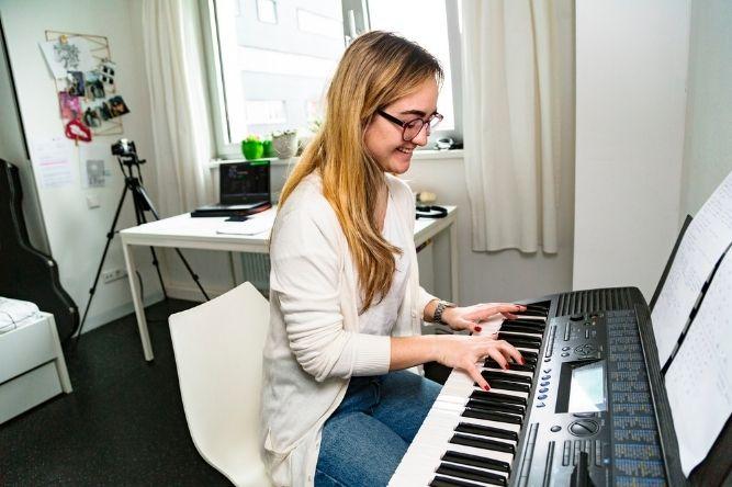 focused on playing piano